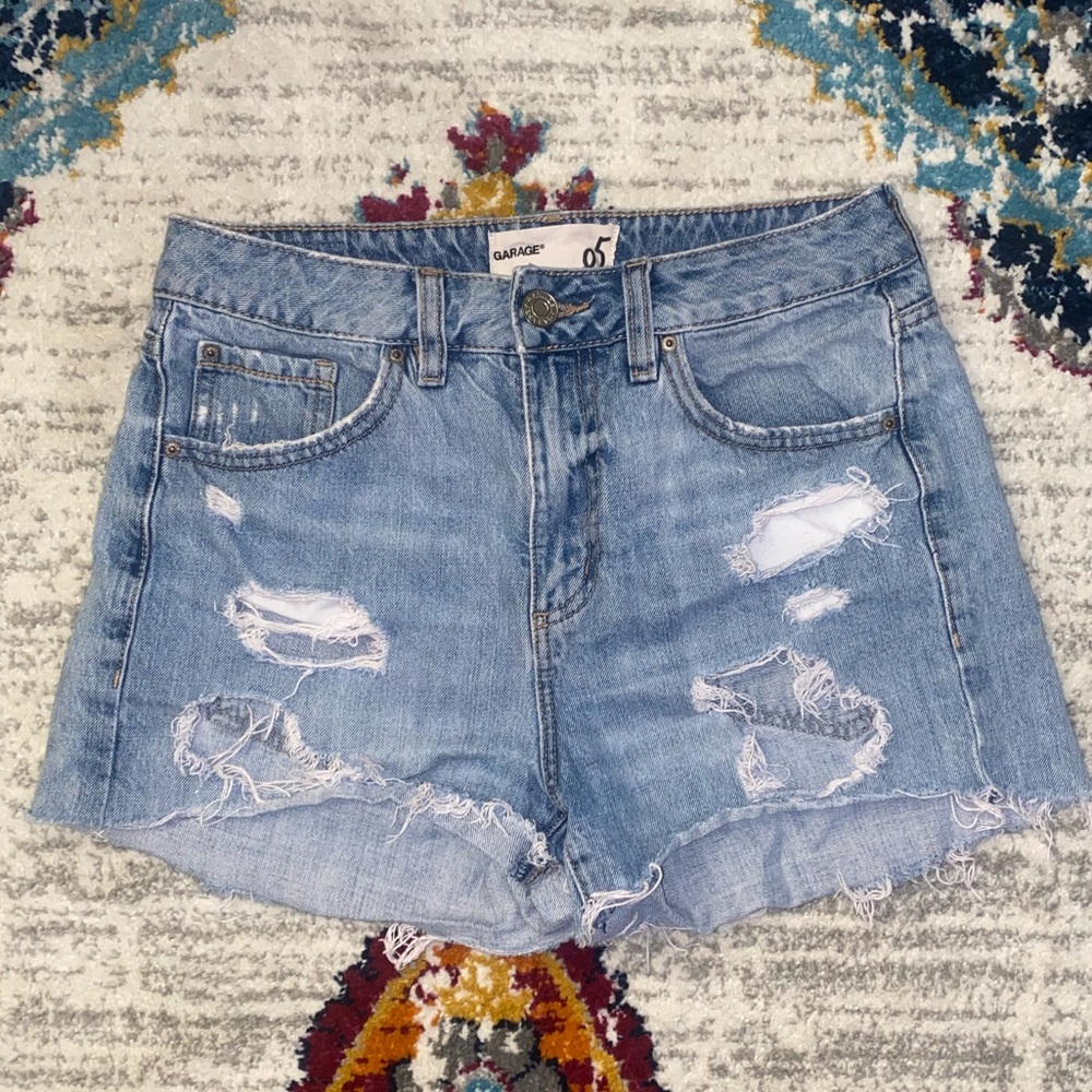 Distressed denim shorts